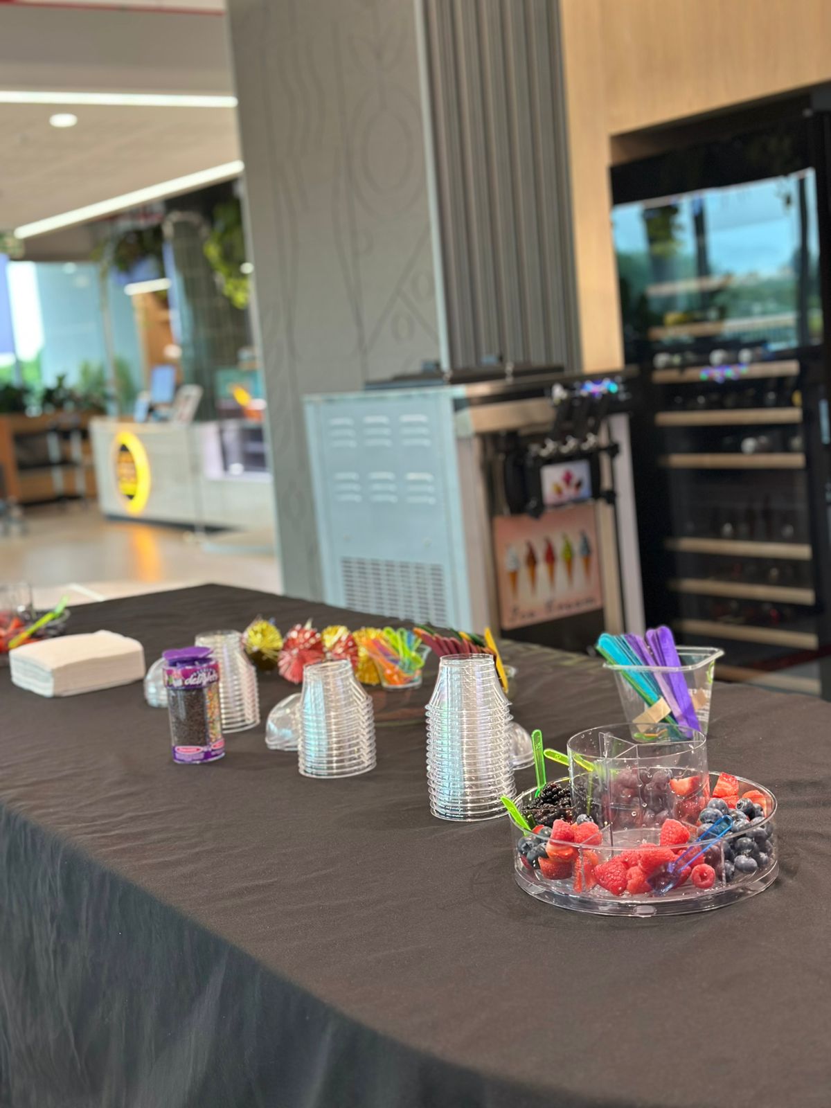 Mobile Wellness Co fresh fruit and smoothie station at an employee wellness event